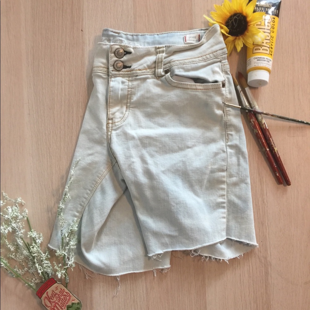 Light wash raw cut shorts